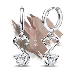 PRICES MAY VARY. Size: The diameter of the open heart earrings is 1.4cm(0.55inch), the total height is 3.1cm(1.22 inches), and the width is 0.95cm(0.37 inches). A single heart-shaped diamond has a size of 0.6cm(0.23 inches) and a total weight of 4g. Lightweight and comfortable, exquisite and fashionable, suitable for daily wear. Open Heart Earrings: An open heart hoop earrings expresses love and bond towards those who open their hearts, wearing open heart jewelry to express their love and bond. Hoop Earrings With Charm, Gifts For Daughter, Heart Hoop Earrings, Dangle Hoop Earrings, Sparkle Earrings, Heart Shaped Diamond, Delicate Jewelry, Crystal Drop Earrings, Huggie Hoop Earrings