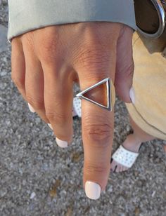 "Triangle Ring Silver/ Sterling Silver Triangle Ring/ Open Triangle Ring/ Chunky Triangle Ring/ Triangle Signet Ring/ Chunky Silver Ring This is a women's sterling silver ring. A triangle silver ring. As you can see in the pictures the ring is quite chunky, but is an elegant and a minimalist design. Also very comfortable. It has a perfect geometrical shape. A triangle represent strength, and can also represent concepts as past, present, future or spirit, mind and body. Urban jewelry, for those who not only want to wear special designs but also with meaning.  Name of the ring : THE INVISIBLE EYE...vision is the art to see what is invisible to others. Every time we make a design of a ring we get inspired in and idea.  We like to transmit this idea to the people. It is not that we just the ma Modern Open Ring For Jewelry Making, Triangle Ring Design, Geometrical Jewelry, Silver Triangle Rings For Gift, Silver Triangle Rings For Gifts, Rings With Triangle Stone, Sterling Silver Triangle Rings For Gifts, Ring With Triangle Stone, Sterling Silver Triangle Rings As Gift