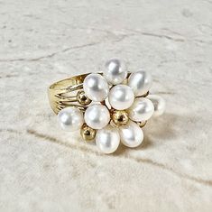 18K Vintage Pearl Ring - 18 Karat Yellow Gold Pearl Cocktail Ring - Gold Pearl Ring - Vintage Rings - Birthday Gift - Best Gifts For Her  A beautiful vintage 18 karat yellow gold cocktail ring featuring 10 white cultured pearls. The ring weighs 4.44 grams. Size 5.75 US / P 1/2 UK. > Ring sizing not included.  This ring can be sized to fit most fingers.  If you need to size this ring, please contact us before placing the order. Sized rings are final sale.  Stamped K18. W: 15.93 mm at widest.  Con White 14k Stamped Pearl Ring For Gift, White Pearl Ring Stamped 14k As Gift, White Cluster Ring Stamped 14k For Anniversary, White Cluster Ring Stamped 14k For Gift, Gift White Cluster Ring Stamped 14k, White Rings Stamped 14k For Anniversary, White Fine Jewelry For Birthday, Fine White Jewelry For Birthday, Fine White Jewelry For Birthdays