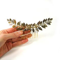 Gold Metal Laurel Tree Leaves Side Hair Comb #0828Colors may appear slightly different through this website due to computer picture resolution and individual monitor settings.Package included : order quantity × hair combItem Features :.Golden tone metal leaves hair comb.Timeless and feminine design hair accessory.Add an elegant touch to your hair style.Wear it for any occasionItem Specifications :.Handmade in Korea.100% brand new with high quality.Metal.Measures approx 5.90 × 1.96 inches (15 × 5 Laurel Tree, Hair Comb Clips, Banana Hair Clips, Side Hair, Party Mode, Design Hair, Golden Hair, Lady Girl, Metal Leaves