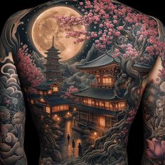 the back of a man's body with tattoos on it and flowers in blooming trees