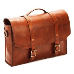 a brown leather briefcase with two straps and buckles on the front, sitting upright