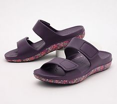 Playfully printed with an eye-catching pattern, these slide sandals are ready for all your summertime adventures. From Alegria. Vacation Sandals With Cushioned Footbed In Purple, Purple Slip-on Slides For Beach, Purple Synthetic Slides For Summer, Purple Slip-on Beach Slides, Purple Slip-on Slides For The Beach, Comfortable Purple Sandals For Summer, Casual Purple Open Toe Slides, Purple Non-slip Sandals For Summer, Purple Slide Sandals For Summer