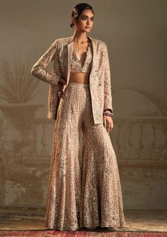 Ridhi Mehra-Barfi Champagne Blazer And Pant Set-INDIASPOPUP.COM Luxury Suits With Zari Work For Festivals, Luxury Traditional Wear With Lace Work For Diwali, Luxury Bollywood Banarasi Silk Palazzo Set, Luxury Brocade Traditional Wear For Ceremony, Luxury Party Wear Skirt Set For Wedding, Luxury Festival Suits With Zari Work, Luxury Sequined Palazzo Set For Eid, Luxury Pants For Eid Wedding, Luxury V-neck Palazzo Set For Wedding