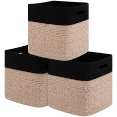 three black and beige storage baskets stacked on top of each other