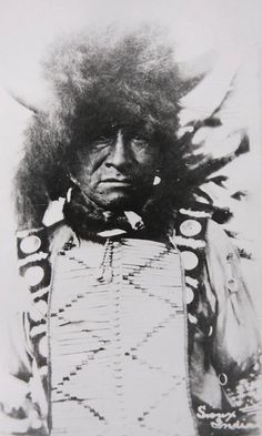 an old photo of a native american man