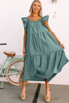 Green Smocked Neckline Flutter Sleeve Maxi Dress Casual Billowy Pleated Dresses, Summer Smocked Midi Dress With Ruffles, Casual Smocked Square Neck Dress, Bohemian Smocked Dress With Ruffled Straps For Summer, Solid Color Tiered Midi Dress For Summer, Casual Dress With Smocked Back And Ruffle Sleeve, Casual Midi Dress With Ruffle Sleeves For Brunch, Casual Smock Dress With Square Neck, Summer Midi Dress With Smocked Bodice And Ruffle Sleeves