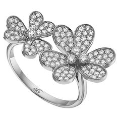 Just in time for Spring! This 18K white gold flower ring is furnished with round pave set diamonds with a total weight of 0.62 carat. * Diamonds are G color, VS2/SI1 clarity * Finger size 6.5 Pink Gold Rings, Diamond Flower Ring, Flower Diamond Ring, Gold Flower Ring, Yellow Gold Diamond Ring, 18k Gold Ring, 18k Yellow Gold Ring, Diamond Flower, Women Diamond