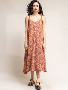 Yui Printed Dress DRESSES Doodlage Orange Sleeveless Dress For Holiday, Orange Bohemian Cotton Midi Dress, Casual Summer Festive Dress, Casual Summer Dress For Festive Occasions, Casual Summer Festival Dress, Orange Tunic Dress For Festival, Festive Summer Cotton Dresses, Festive Bohemian Orange Dress, Spring Festive Cotton Maxi Dress