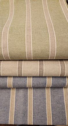 three different striped fabrics stacked on top of each other