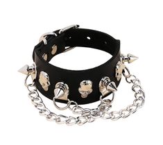 "Chained Up": Show off your gothic flair with this sassy Chained Up Black Leather Choker and Bracelet Set! Constructed from sleek black leather, the set features shiny chains and rings for a sultry yet edgy look. The adjustable choker and bracelet make it easy to show off your unique style. The bracelet is adorned with spikes and skulls. Ready to take the world by storm? It's time to get 'chained up'!😉 Necklace measures approximately 17" and is adjustable. Bracelet measures approximately 9.5 an Punk Black Jewelry With Chain Strap, Black Punk Jewelry With Chain Strap, Edgy Adjustable Chain Strap Jewelry, Gothic Metal Jewelry With Chain Strap, Black Gothic Bracelets For Biker Events, Black Rocker Jewelry With Rivets, Rock Style Jewelry With Rivets For Party, Black Edgy Jewelry With Chain Strap, Black Rock Style Jewelry For Halloween