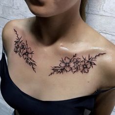 a woman's chest with flowers on it