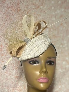 Cream Button Fascinator Half Hat for Church Head Covering, Tea Party, Wedding, and Other Special Occasions This cream circular hat is trimmed with veil and sinamay bows. Beautiful show-stopper! Mannequin is wearing size 6 inches. Available in 3 sizes  6 inches diameter 7 inches  8 inches  Hat affixes to head by hat string. Handmade gifts for mom, sister, wife, or yourself. Love what you see, but would like it in a different color, shape or size? Please contact us by sending a message. We offer custom hats in a variety of styles. PLEASE NOTE All items for Free Shipping will be shipped via USPS First Class Mail. Elegant Headband Fascinator For Vintage Events, Elegant Fascinator Headband For Vintage Events, Kentucky Derby Vintage Fascinator Headband, Party Bridal Hat Accessories, Fitted Bridal Accessories For Royal Ascot Party, Elegant Gold Top Hat For Formal Occasions, Elegant Gold Fitted Top Hat, Fitted Headband Fascinator For Vintage Events, Gatsby Style Costume Hat For Wedding