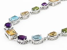 9.60ctw rectangular octagonal and 2.60ctw Pear Shaped Citrine, 4.90ctw Rectangular Cushion And 3.10ctw Trillion Glacier Topaz™, 6.60ctw Oval And 1.40ctw Round Amethyst, 2.80ctw Oval Manchurian Peridot™ Rhodium Over Sterling Silver Necklace. Measures Approximately 0.39"W. Lobster Clasp With 2" Extender. Elegant Multicolor Gemstones For Formal Occasions, Formal Multicolor Fine Jewelry Gemstones, Cushion Cut Gemstones With Accent Stones For Fine Jewelry, Luxury Cushion Cut Multi-stone Jewelry, Formal Multi-stone Cubic Zirconia Gemstones, Luxury Multi-stone Cushion Cut Jewelry, Cushion Cut Gemstones With Accent Stones For Formal Occasions, Formal Cushion Cut Gemstones With Accent Stones, Oval Multicolor Jewelry For Formal Occasions