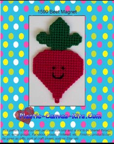 a red strawberry with a green leaf on it's head is featured in this pattern