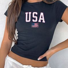 USA Flag Baby Tee, Distressed 4th of July Crop Top, Retro USA BabyTee, Y2k Usa Flag Tee, Usa shirt, 4th of july flag Shirt, Merica Shirt  ------------------------------------------------- This youth-sized baby tee brings back the classic 90's style. It's a miniature version of a t-shirt, distinct from modern crop tops. Be sure to check the size chart before purchasing to ensure the perfect fit. 📏 SIZING: The Gildan 5000B is a "youth" t-shirt. Reflecting the authentic baby tees of the 90s, it re Black T-shirt With American Flag For 4th Of July, Black Flag Print Top For Summer, Black Tops With Flag Print For Summer, Black Tops With American Flag Print For Summer, Black Summer Top With American Flag Print, Black Cotton Tops With American Flag Print, Casual Black Top With Flag Print, Patriotic Black Top With Flag Print, American Style T-shirt With Flag Print For Spring