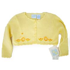 Brand New With Tags. This Pretty Yellow Sweater Embroidered With Flowers At The Bottom Of The Sweater On Each Side Of The Button Closure. Scallop Edging At The Neck, Down The Front Closure, Cuffs And Hem Of The Sweater. There Are 4 Yellow Buttons That Run Down The Front Of The Sweater. A Sweet Addition To Any Little Girl's Wardrobe. Size: 24m Material: 100% Cotton Condition: Brand New With Tags Brand: 2nd Step Sweater Chest: 13" / 33cm Length: 9" / 22.9cm Yellow Tops For Spring Playwear, Yellow Spring Tops For Playwear, Fitted Yellow Tops For Playtime, Fitted Playful Tops For Spring, Long Sleeve Summer Tops For Playwear, Cute Spring Playwear Tops, Cute Spring Tops For Playwear, Long Sleeve Tops For Playtime In Summer, Long Sleeve Tops For Summer Playtime