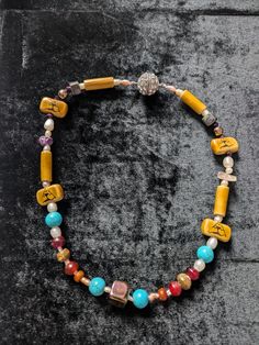 Beautiful ceramic beads necklace with tribal type of elements,has some turquoise,big metal magnet with diamante elements to close it. few pearls Ceramic Beads Necklace, Wedding Necklaces, Wedding Jewellery Necklace, Ceramic Beads, Beads Necklace, Wedding Necklace, Number 1, Charm Necklace, Wedding Jewelry