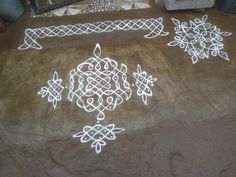 an intricate design is painted on the ground