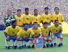 the soccer team poses for a photo before their match against england at an olympic stadium