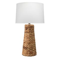 a table lamp with a white shade on it