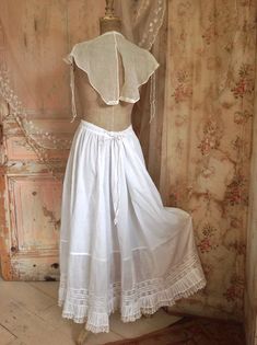 beautiful muslin cotton lace collar, modesty panel, jabot fake blouse or dicky with 2 cute tie buttons lace ruffles even piped  seams from 1890s there is a bit discoloration to be seen one size fit's all.. Regency Style Ruffled Petticoat For Daywear, Daywear Ruffled Petticoat, Victorian White Petticoat With Ruffles, Victorian White Ruffled Petticoat, Cottagecore Victorian Dress With Ruffles For Daywear, Vintage Lace Petticoat With Ruffles, Vintage White Victorian Day Dress With Ruffles, Vintage White Victorian Dress With Ruffles For Daywear, Vintage Victorian Cotton Dress With Ruffles