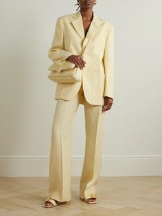 Jacquemus' blazer is perfectly tailored in a boxy shape inspired by menswear. It has strong, powerful shoulders and inverted darts along the front. Style yours with the matching pants and accessories in the same pastel-yellow shade. Jacquemus Blazer, Yellow Suit, Fox Fur Jacket, Fur Jackets, Yellow Blazer, Yellow Outfit, Fox Fur Coat, Matching Pants, Fur Coats