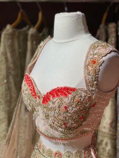 Light pink intricate with fully sequence, studs motifs thread embroidery and crystal stone work lehenga embellished with beautiful outline in red sequins paired with sweetheart neckline blouse and net dupatta. Fabric Net Custom designed according to client measurements and color preference. Production and delivery time is 90days! Designer Hand Embellished Pink Anarkali Set, Pink Hand Embellished Anarkali Traditional Wear, Hand Embellished Pink Anarkali Traditional Wear, Hand Embellished Choli For Diwali Designer Wear, Pink Bollywood Hand Embellished Dupatta, Pink Bollywood Style Hand Embellished Dupatta, Designer Pink Hand Embellished Sharara, Hand Embellished Bollywood Blouse Piece For Reception, Bollywood Style Pink Hand Embellished Dupatta