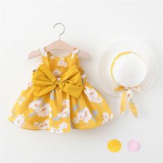 Toddler Infant Baby Girls Summer Princess Dresses Vacation Beach Sleeveless Hat Set Ruffles Bow Floral Dress 0-3Y Feature: 90% Cotton, 10% polyester Hand Wash Only EXCELLENT FABRIC: Baby girls summer dress sleeveless backless princess birthday party dresses toddler little girl floral bowknot sundress with sun hat, casual beach dress outfit clothes set, are well made of cotton blend, soft and breathable fabric, comfortable to wear, give your baby comfortable wearing experience SUMMER CUTE DESIGN: Floral Beach Dresses, Baby Mode, Printed Casual Dresses, Princess Outfits, Vestido Casual, Dress Hats