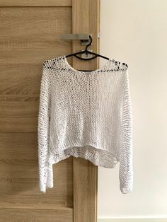 "Hand knit cotton sweater Color on the photo : White Size on the photo: M ✔️55 % cotton  ✔️45 % acrylic  PRE-ORDER READY TO SHIP sweaters there: https://www.etsy.com/shop/TianashopUa?section_id=27482280 This sweater has  a loose weave, it may stretch, therefore the size measurement various.   Dimensions for XS size: Length - 44 cm. / 14.9\" Width - 48-53 cm. / 18.9\"-20.8\" Sleeve lenght - 62-65cm. /24.4\"-25.5\" Sleeve girth- 28cm. / 11\" Weight - 0.19 kg. /6.7oz Dimensions for S size: Length - 44 cm. / 14.9\" Width - 50-55 cm. / 19.6\"-21.6\" Sleeve length - 62-65cm. /24.4\"-25.5\" Sleeve girth  - 28 cm. / 11\" Weight - 0.19 kg. /6.7oz Dimensions for M size: Length - 45 cm. / 17.7\" Width - 54-58 cm. / 21.2\"-22.8\" Sleeve lenght - 68-70 cm. /26.7\"-27.5\" Sleeve girth- 30 cm. / 11.8\" W Thrift List, Hen Do Outfits, Dream Wishlist, Mohair Cardigan, Summer Sweaters, Cotton Gifts, Natural Women, Arm Knitting, Sweater White