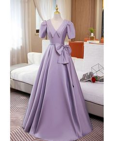 Buy purple vneck collar long formal dress with big bow knot at cheap price online. Free stable shipping and pro custom service since 2009. Cheap Long Sleeve Purple Dresses, Lavender V-neck Dress For Formal Occasions, Elegant Lavender Evening Dress For Banquet, Elegant Purple A-line Maxi Dress, Purple V-neck Evening Dress For Party, Floor-length Prom Dress With Bow, Lavender Evening Dress For Prom Banquet, Lavender Evening Dress For Banquet And Prom Season, Bow Evening Dress For Banquet During Prom Season