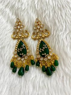 Sabyasachi inspired uncut Polki Kundan designer earrings. Gold plated. Semi precious stones and beads. Length 13cm If have any queries please ask. Kundan Jhumkas For Festivals, Traditional Jhumkas For Designer Festivals, Traditional Meenakari Jhumkas For Designer Wear, Festive Jeweled Bollywood Chandbalis, Traditional Jeweled Dangle Danglers, Traditional Chandbali Jhumkas For Designer Wear, Elegant Green Chandelier Earrings With Stone Work, Festive Jeweled Chandbali Earrings, Festive Jeweled Chandbali Bridal Earrings