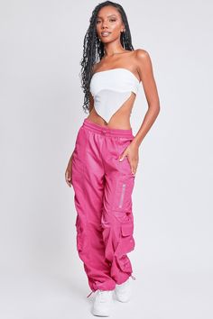 It’s giving off-duty vibes! Our Women's High-Rise Rouched Nylon Jogger is the perfect baggy pant to add to your wardrobe! Designed with an adjustable bungee cord at the elasticized waistband for the perfect fit and comfort. These high waisted pants are meant to be oversized with a baggy and slouchy fit. Featuring silver hardware and large cargo pockets for a sporty-chic vibe. We’ve also added adjustable bungee cords at the bottom hems to give you the option of wearing them more scrunched up at the ankle. Pair these with a crop top and sneakers for a sporty look, or pair with a corset top and combat boots for an edgier feel. Product Details - High-Rise - Elasticized Waistband with Bungee- Single Zip Close Pocket at Thigh- 2 Flap Cargo Pockets at Lower Side - Baggy Fit - Drawstring Hems Size Seafoam Color, Ymi Jeans, Bungee Cords, Bungee Cord, Cargo Joggers, Baggy Pant, Summer Blue, Cardigan Top, Sporty Chic