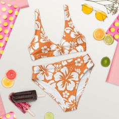 It’s so easy to fall in love with this bikini set. Removable pads and its double-layer make it comfy to wear all day by the pool or at the beach. • Double-layered and non-reversible • Removable padding • Tear-away care label • Zig-zag stitching *Separates (Top and Bottom) with this design are listed separately. This product is made especially for you as soon as you place an order, which is why it takes us a bit longer to deliver it to you. Making products on demand instead of in bulk helps reduc Beachy Seamless Swimwear For Vacation, Orange Seamless Swimwear For Beach, Seamless Orange Beach Swimwear, Orange Seamless Swimwear For The Beach, Tropical Bra-friendly Swimwear For Sunbathing, Trendy Orange Swimwear For Vacation, Summer Seamless Swimwear For Beach Party, Beachy Seamless Swimwear For Poolside, Orange Seamless Swimwear For Vacation