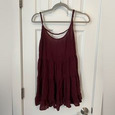 Is A Long Shirt But Could Be A Dress For Small Child! Never Worn Because I Thought It Was A Dress. Brandy Melville Is One Size Fits All. Burgundy V-neck Top For Summer, Summer Burgundy Sleeveless Top, Burgundy Sleeveless Summer Top, Summer Burgundy V-neck Top, Burgundy V-neck Summer Top, Casual Burgundy Tops For Day Out, Brandy Melville Shirts, Long Shirt, A Dress