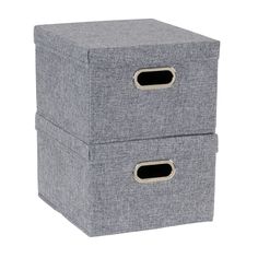 two grey fabric storage boxes with handles on each side and one is open to show the bottom