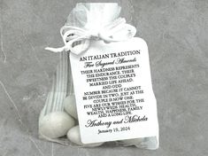 two eggs in a bag tied with a white ribbon and the words, antalantatraction