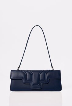 Front of a Blue Leather Shoulder Flap Bag Hilda with a raised design flap and Lazaro logo. Timeless Blue Shoulder Bag For Evening, Elegant Blue Soft Leather Shoulder Bag, Luxury Blue Baguette Bag, Luxury Blue Rectangular Baguette Bag, Elegant Blue Baguette Bag For Evening, Formal Blue Rectangular Flap Bag, Classic Blue Rectangular Shoulder Bag, Blue Rectangular Flap Bag For Formal Occasions, Formal Blue Flap Bag With Detachable Strap