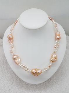 Pearl color: gold, white  Pearl shape: baroque, rice Pearl size:  Baroque: approx 1 x 0.6 inches Rice: 4.5 mm Necklace Length: 19 inches  Closures: gold plated brass with cubic zirconia clasp ▪Pearl has been treated to enhance its beauty, commonly cleaned and polished.  This elegant design beaded necklace would be the perfect gift for many occasions like Anniversary, Christmas,  Valentine's day, birthdays, weddings, thanksgivings,  proms, etc.   Disclaimer,  ♡ Photos may have been enlarged. ♡ Product color may slightly vary due to photographic lighting sources or your device display.  Care directions  ☆ Do not wear your pearl jewelry when showering,  doing workouts, to the beach or pool. Pearls exposed in hot water may loose its luster. ♡ Handmade with lots of loves ♡ Gold Baroque Single Strand Necklace, Gold Pear-shaped Single Strand Pearl Necklace, Gold Baroque Pearl Necklace With High Luster, Handmade Gold Baroque Pearl Necklace, Single Strand Baroque Pearl Necklaces In Pear Shape, Classic Baroque Pearl Necklace With High Luster, Single Strand Pear-shaped Baroque Pearl Necklaces, Single Strand Baroque Pearl Necklaces, Handmade Baroque Gold Pearl Necklace