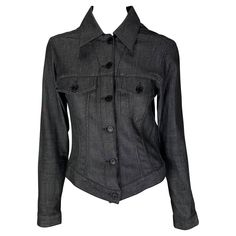 TheRealList presents a black Gucci trucker-style jean jacket, designed by Tom Ford. This jacket, released in 2001, adds the perfect luxury pop to the average jean jacket. The front of the jacket is adorned with black Gucci logo buttons as well as at the breast pockets and cuffs. Follow us on Instagram! @_the_reallist_ Approximate measurements: Size - IT40 34" bust 30" waist 23" shoulder to cuff 19.5" underarm to cuff 19" shoulder to hem 98% cotton, 2% elastane Gucci Black Winter Tops, Vampire Core, Jean Jacket Design, Monogram Jacket, Tom Ford Gucci, Gucci Jeans, Gucci Runway, Gucci Jacket, Gucci Outfits