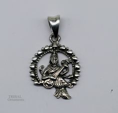 Indian Hindu Idols Blessing Goddess Saraswati or Sharda maa vintage antique style stunning divine pendant, best gifting unisex jewelry from India. Metal-925 sterling silver. Item type-Pendant Weight-4.630 grams. Height-3.8 centimeter. Width-2.2 centimeters. Stamped-925. Finish-Oxidized. note: chain is not included in this price Make excellent gifting and collectible pieces(gift for birthday, wedding, anniversary, mother's day, fathers day, Christmas day,) We take absolute care of precious jewels Temple Jewelry For Navratri Gift, Navratri Temple Jewelry Gift, Spiritual Pendant Jewelry For Festive Occasion, Round Pendant Jewelry For Festivals, Symbolic Pendant Jewelry For Festivals, Festive Spiritual Sterling Silver Jewelry, Festive Spiritual Pendant Jewelry, Spiritual Locket Jewelry For Festive Occasions, Spiritual Festive Gift Jewelry