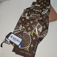 Authentic Louis Vuitton Bandeau/ Scarf, 100% Silk, Bnwt. Purchased Myself. Impossible To Buy This Beautiful Scarf Anymore Marron Color, Bandeau Scarf Louis Vuitton, Louis Vuitton Black Scarf, Louis Vuitton Bandeau, Louis Vuitton Scarf Silk, Logomania Scarf Louis Vuitton, Louis Vuitton Scarf, Beautiful Scarf, Sneakers Fashion Outfits