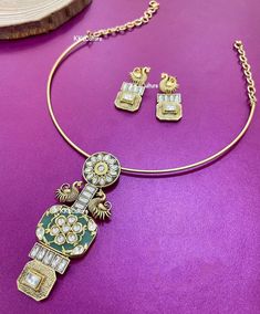 "Simply Splendid - Another beautifully crafted hasli necklace set to gleam your festive appearance. This Designer Amrapali Ethnic Fusion gold finish hasli  is studded with Kundan on mint green, pink & blue glass & bird motif on either side. Comes with matching stud style earrings. Style this with any Ethnic or Indo Western Attire. 💥Pendant Size: 3\" approx 💥Statement Necklace Set, adjustable speciality chain. We want you to LOVE your new jewelry!  CARE TIP  1. Keep away from moisture and perfume 2. Store in cotton or zip lock bags or air tight boxes. 3. Spot cleaning only. 4. Jewellery is the last thing you should wear and the first thing you should remove. 💕Send us an email if you need help! ✅ Contact Us: +1 (732) 325-2222" Luxury Gold Fusion Jewelry Sets, Festive Chandbali Kundan Necklace With Motifs, Festive Kundan Pendant Necklace For Diwali, Chandbali Motif Necklaces For Diwali, Festive Necklace With Diwali Motifs, Diwali Festive Kundan Pendant Necklace, Motif Necklaces For Diwali Celebration, Festive Necklace With Motifs For Diwali, Diwali Celebration Necklace With Motifs