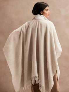 Wool-Blend Poncho with Pockets | Banana Republic Cozy Wool Poncho Cape, Oversized Cozy Cashmere Cape, Cozy Oversized Cashmere Cape, Cozy Oversized Cape For Cold Weather, Cozy Cape For Cold Weather, Oversized Wool Poncho For Layering, Oversized Fringe Shawl Cape, Oversized Cozy Cashmere Poncho, Oversized Fringe Cape Poncho