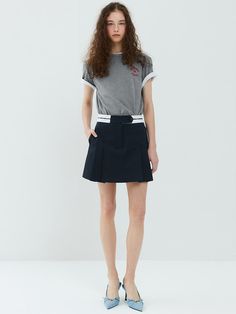 This soft skirt with the perfect pop of pretty.A smooth fabric with comfort stretch and a soft texture.Our fabric gives these skirt flexible comfort and it hugs your silhouette. - Lovely and cute mini skirt - Brand logo on the belt - Side zip closure and belt loops - Whether you add a tee or a blazer, you'll have plenty of pairing options with this chic style- It's soft and comfy with soft polyester blend Chic Mini Hem Pleated Skirt With Lining, Chic Pleated Mini Skirt With Lining, Chic Mini Hem Pleated Skirt, Chic Pleated Skort With Mini Hem, Stretch Cotton Skort For Workwear, Relaxed Pleated Skort With Mini Hem, Chic Mini Hem Skort With Flowy Skirt, Chic Mini Skort With Flowy Skirt, Chic Mini Hem Flowy Skort