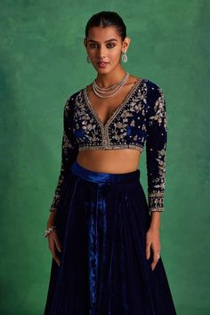 Blue blouse featuring embroidered floral jaal motifs highlighted by sequins, pearls and crystal embellishments. Comes with solid flared lehenga and floral butti embroidered dupatta. - Aza Fashions Elegant V-neck Lehenga With Resham Embroidery, Elegant V-neck Lehenga With Zari Work, Bollywood Style Lehenga With V-neck And Mirror Work, Elegant V-neck Choli With Resham Embroidery, Designer V-neck Choli With Resham Embroidery, Embellished V-neck Blouse For Reception, Traditional V-neck Choli With Intricate Embroidery, Festive V-neck Choli For Reception, Bollywood Lehenga With V-neck Unstitched Blouse