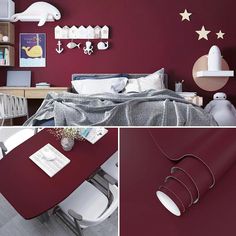 a bedroom with red walls, white furniture and stars on the wall above the bed