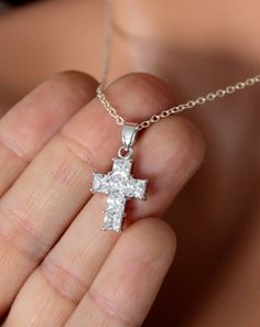 This is a beautiful and simple Crystal Cross necklace made in Sterling Silver with sparkling Cubic Zirconia Crystals.  Cross pendant is sterling silver, measures 16x12mm with clear inset crystals.  Necklace chain is Sterling Silver with spring clasp closure in back.  This necklace may be ordered on a 16", 18", 20" or 22" chain. Comes nicely boxed, the perfect gift!Also comes in similar Gold Filled version, see last two pictures.Necklace will ship in 3-5 business days.Please message me if you hav Sterling Silver Cross Jewelry With Rhinestones, Sparkling Clear Jewelry For Gifts, Sparkling Clear Jewelry Gift, Sterling Silver Rhinestone Jewelry Gift, 14kt Gold Jewelry, Custom Necklaces, Cross Necklace Women, Clean Sterling Silver, Crystals Necklace