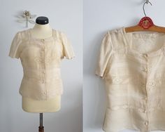 "Vintage 1930s -1940s raw silk thread known in Romania as borangic blouse with square neckline, short sleeves and closes with snaps. -- M E A S U R E M E N T S --- fits like: small/ medium bust: 38\" waist: 33\" length: 22\" brand/maker: n/a condition: excellent see last photo Shipping Is Avaliable Worldwide. Every item is carefully shipped Priority via Air Mail - shipping takes from 7 to 14 working days, depending on your location. Shipping includes Tracking. Come and check out our shop to see Fitted Vintage Blouse With Square Neck, Vintage Square Neck Blouse For Summer, Vintage Short Sleeve Beige Blouse, Vintage Beige Blouse With Short Sleeves, Vintage Beige Short Sleeve Blouse, Vintage Cream Short Sleeve Blouse, 40s Outfits, Raw Silk Blouse, Silk Thread