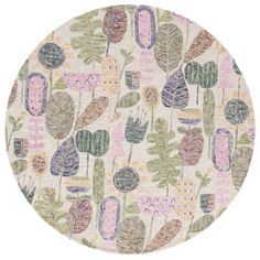 a round rug with various plants and leaves in pastel colors on a white background